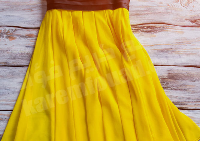حلم فستان أصفر طويل للحامل ومعرفة نوع الجنين
